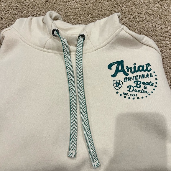 Ariat Tops - Ariat Cream Pullover with Teal Graphic